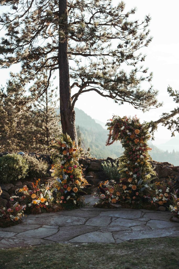 Wedding altar floral arch detail shot at the Griffin House in Hood River Oregon