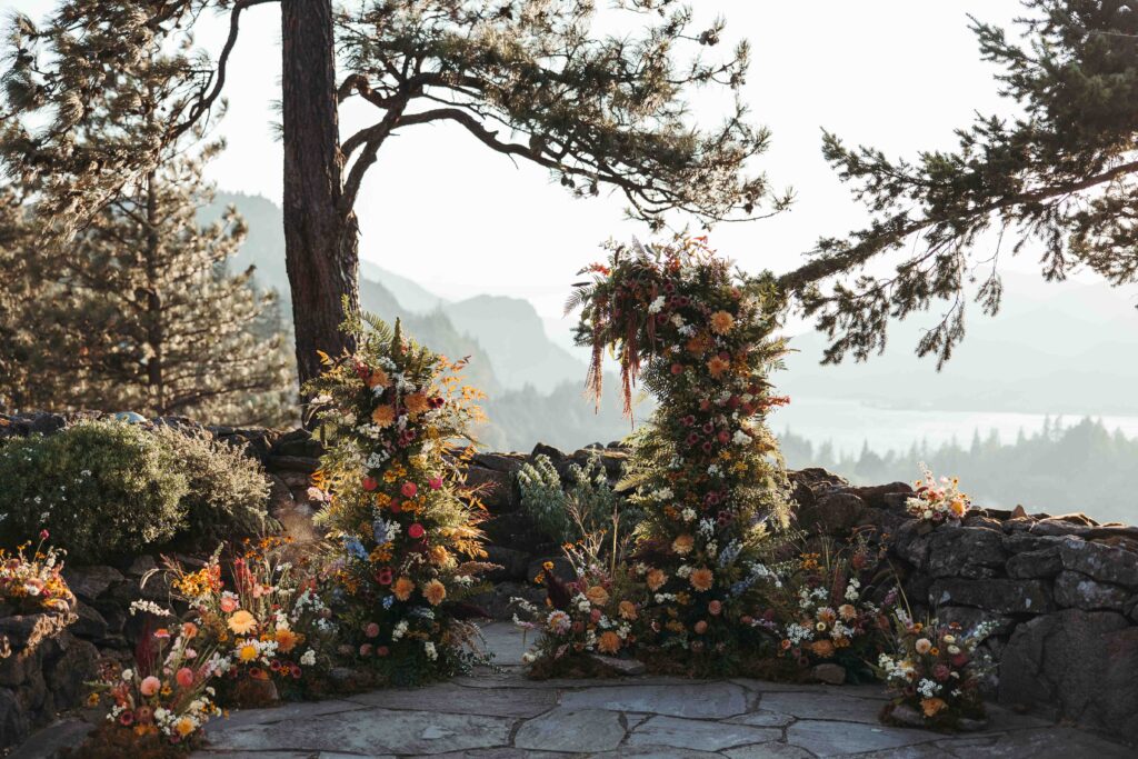 Wedding altar floral arch detail shot at the Griffin House in Hood River Oregon
