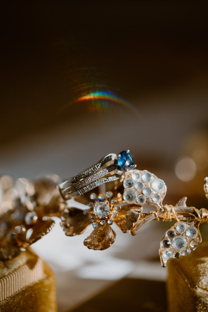 Wedding timeline planning detail flat lay with invitation suite and rings