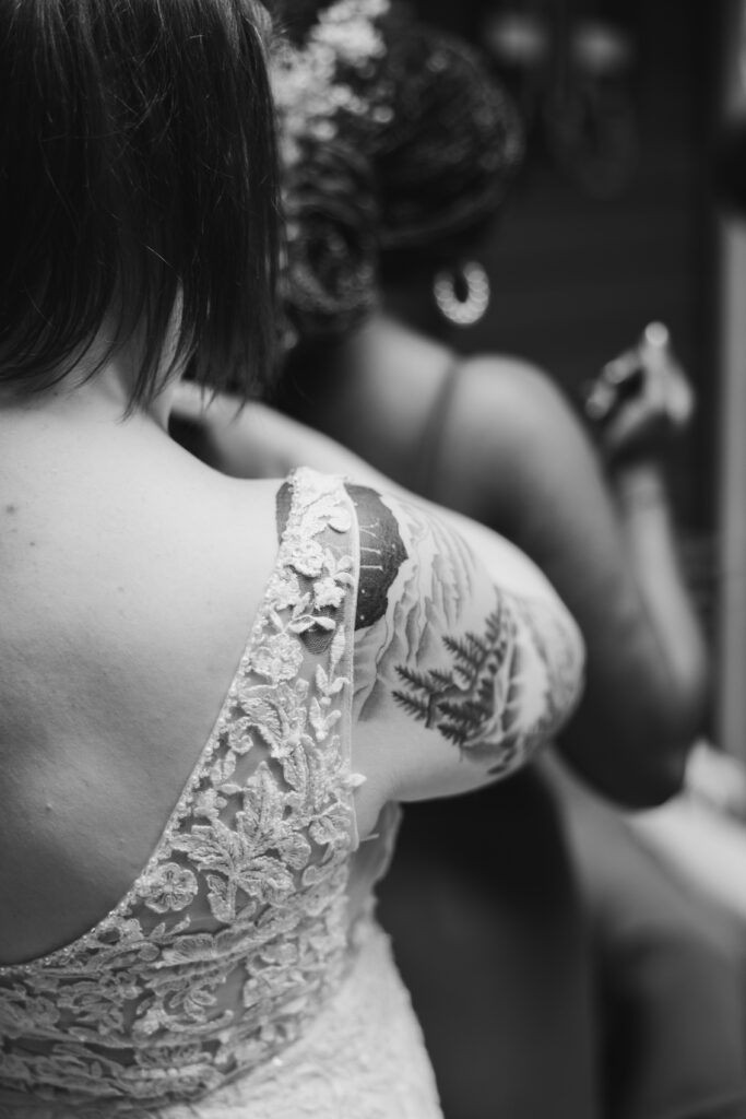 lace wedding dress detail photo of a plus sized bride