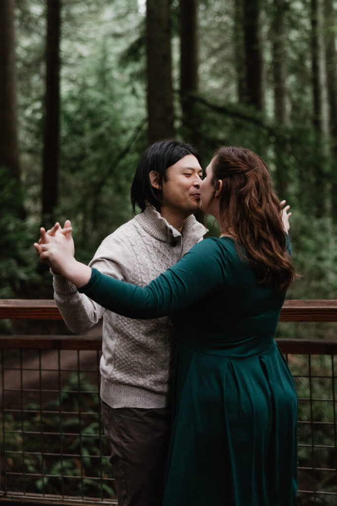 Natural candid engagement photo in Portland OR forest