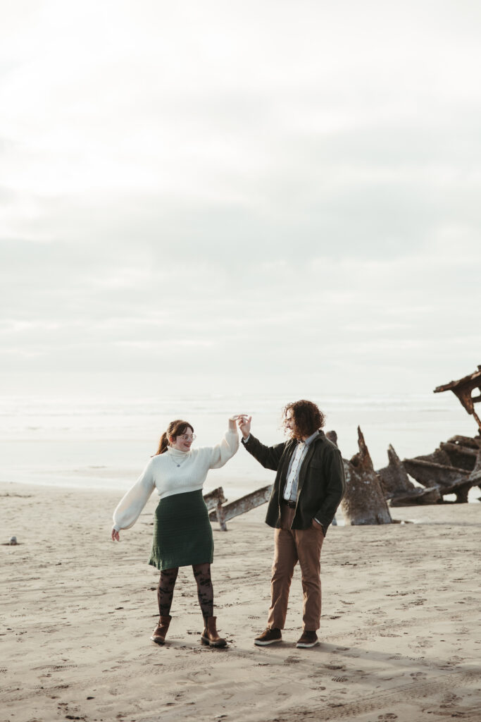Moody overcast engagement photos at the Peter Iredale Astoria Oregon
