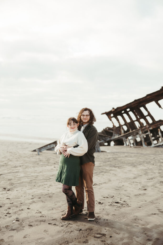 Engagement portrait at the Peter Iredale shipwreck Astoria Oregon at golden hour
