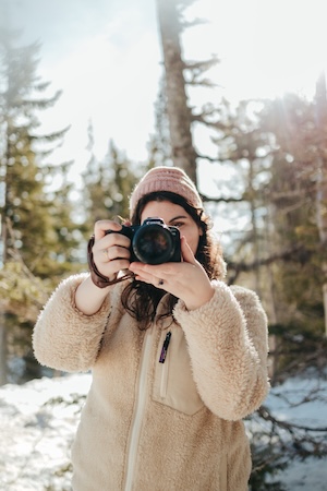 Hunter and Lindsey Wickert capturing a wedding ceremony from two angles in Vancouver, WA