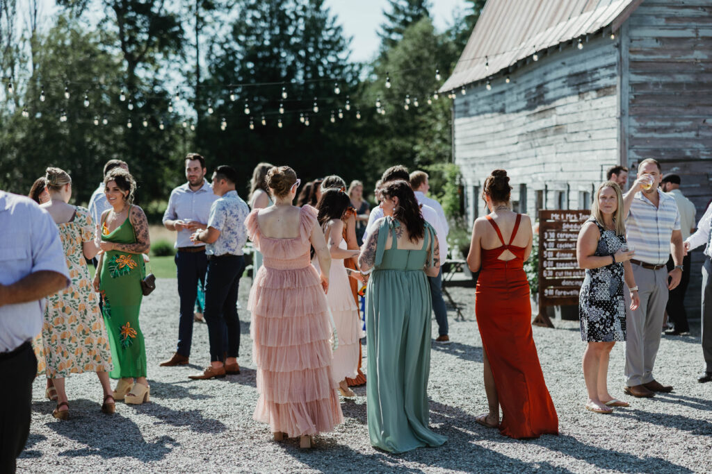 Guests dancing at summer wedding reception at Mount Peak Farm Enumclaw Washington