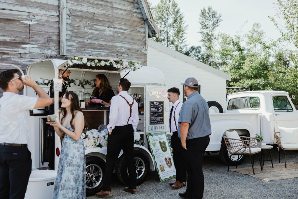 Cocktail trailer reception bar at Mount Peak Farm wedding in Enumclaw Washington