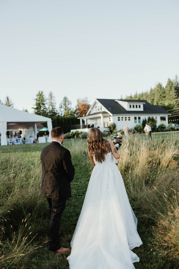 Bride and groom laughing during golden hour portraits at Mount Peak Farm Enumclaw Washington wedding photographer