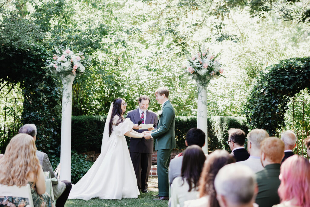 Bride and groom exchanging vows in the gardens at Deepwood Museum and Gardens — Salem Oregon wedding