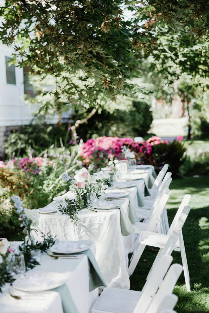 Elevated floral tablescape with lush summer arrangements on white linen tablecloths at Deepwood Museum and Gardens — Salem Oregon wedding photographer