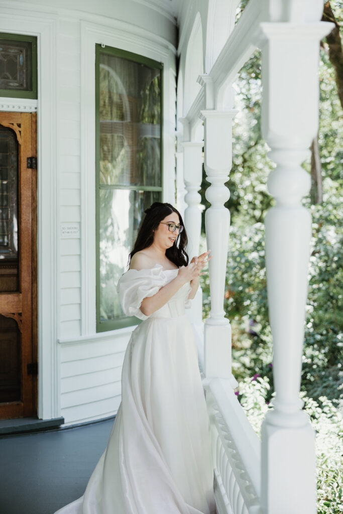 Bride getting ready on the porch with her mother at Deepwood Museum and Gardens in Salem, Oregon