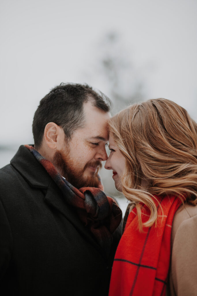 portrait of newly engaged couple josh and alysa taken by their engagement photographer lindsey wickert