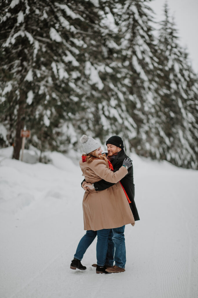 snowy forest engagement photo up at mt. st. helens in southwest washington